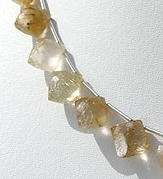 Golden Rutilated Quartz Puffed Diamond Cut