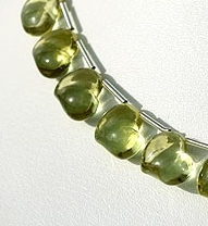 Lemon Quartz Natural Gemstone is varied minerals on earth, possess property of transparent eye clean with vitreous luster and are available in green-gold color with smooth polish, Twin Heart Shape.