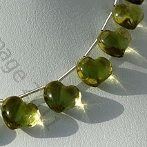 Lemon Quartz Natural Gemstone is varied minerals on earth, possess property of transparent eye clean with vitreous luster and are available in green-gold color with smooth polish, Twin Heart Shape.