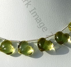 Lemon Quartz Natural Gemstone is varied minerals on earth, possess property of transparent eye clean with vitreous luster and are available in green-gold color with smooth polish, Twin Heart Shape.