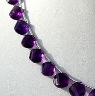 8 inch strand Amethyst Gemstone Twisted Heart Briolette