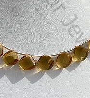 Honey Quartz Twisted Heart Briolette