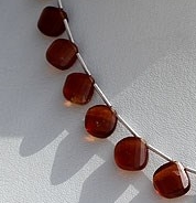 Spessartite Gemstone Twisted Heart Briolette