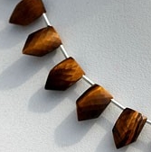 Tiger eye gemstone pentagon shape beads.