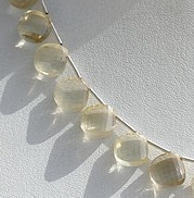 Scapolite Gemstone Twisted Heart Briolette