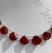 Spessartite Gemstone Twisted Heart Briolette